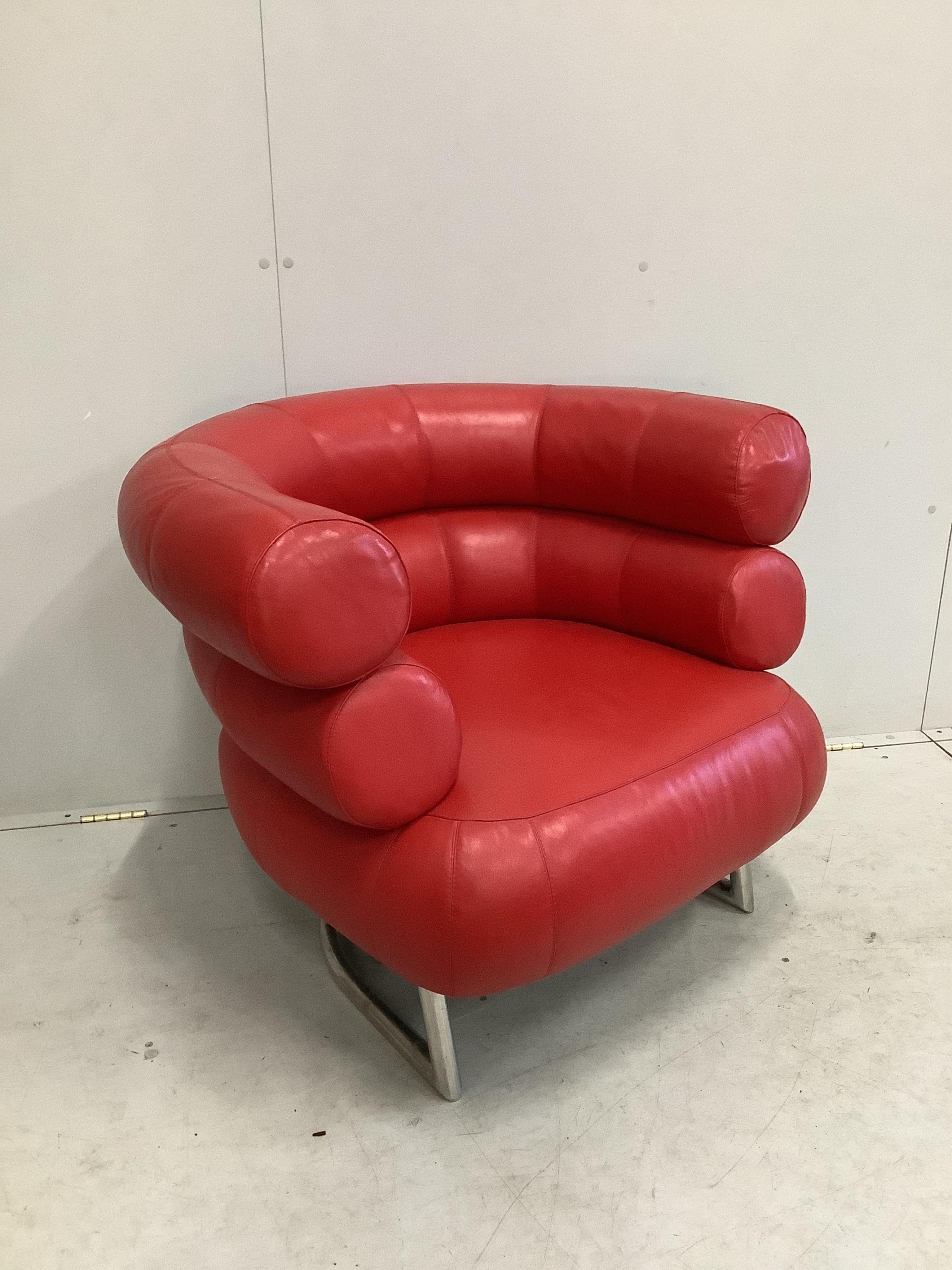 A Contemporary Eileen Gray Bibendum red leather armchair, width 92cm, depth 74cm, height 74cm. Condition - good